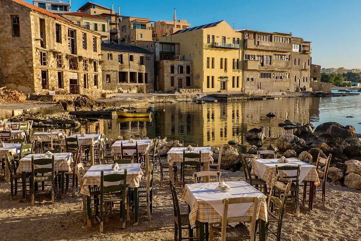 Narrow stone street with traditional houses in Chania Old Town