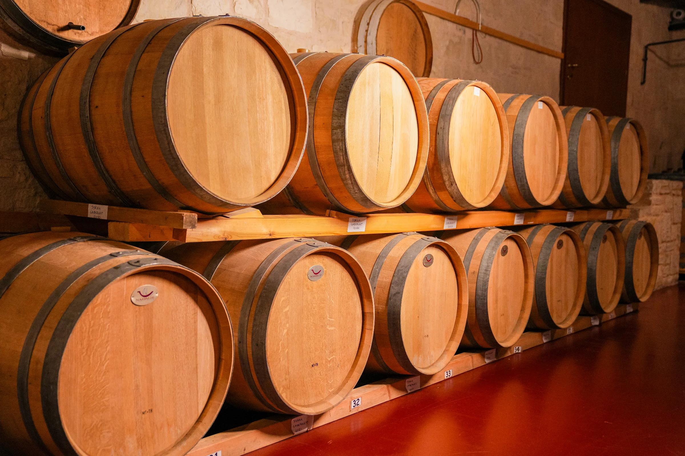 A cellar rack of barrels used for ageing Cretan red wine