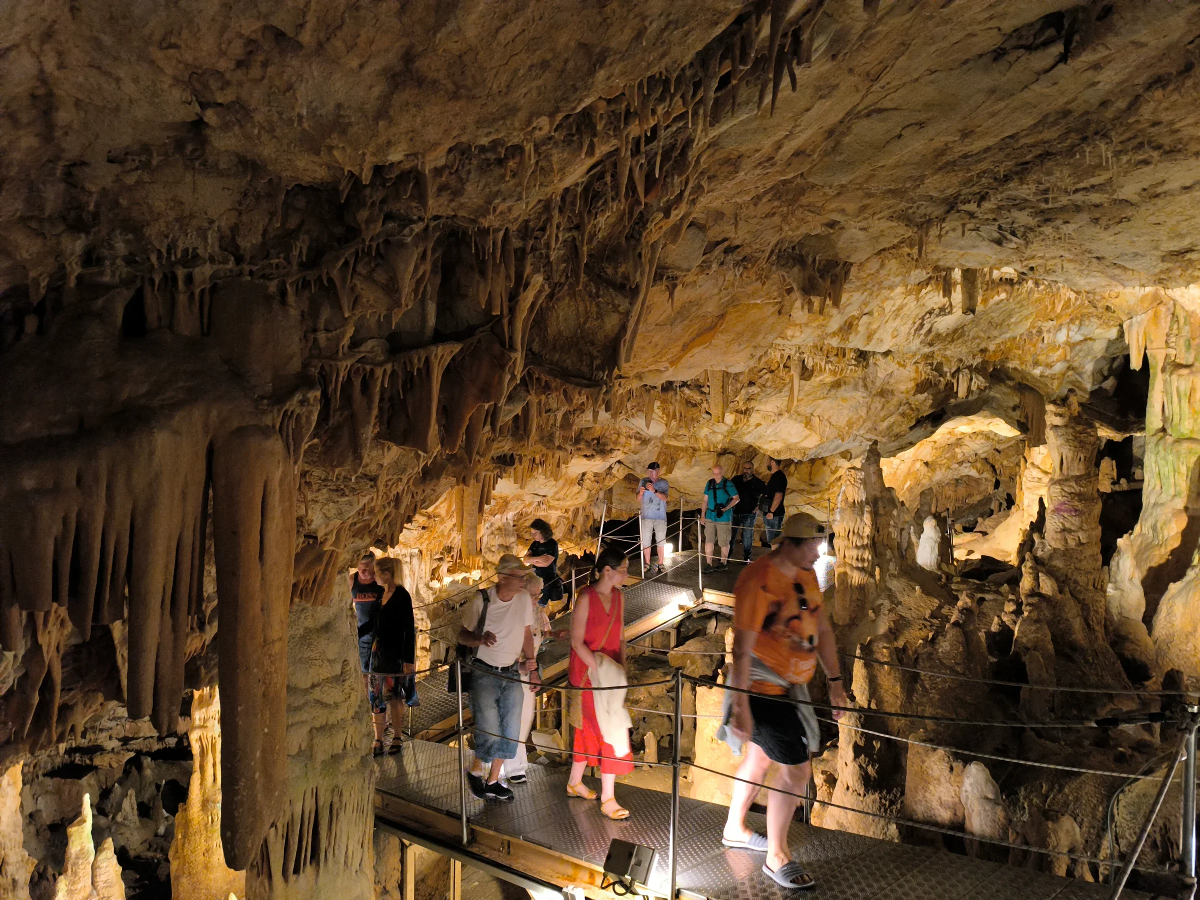 Travellers looking into the Cave of Zeus (Diktaion Andron) on a Crete safari stop